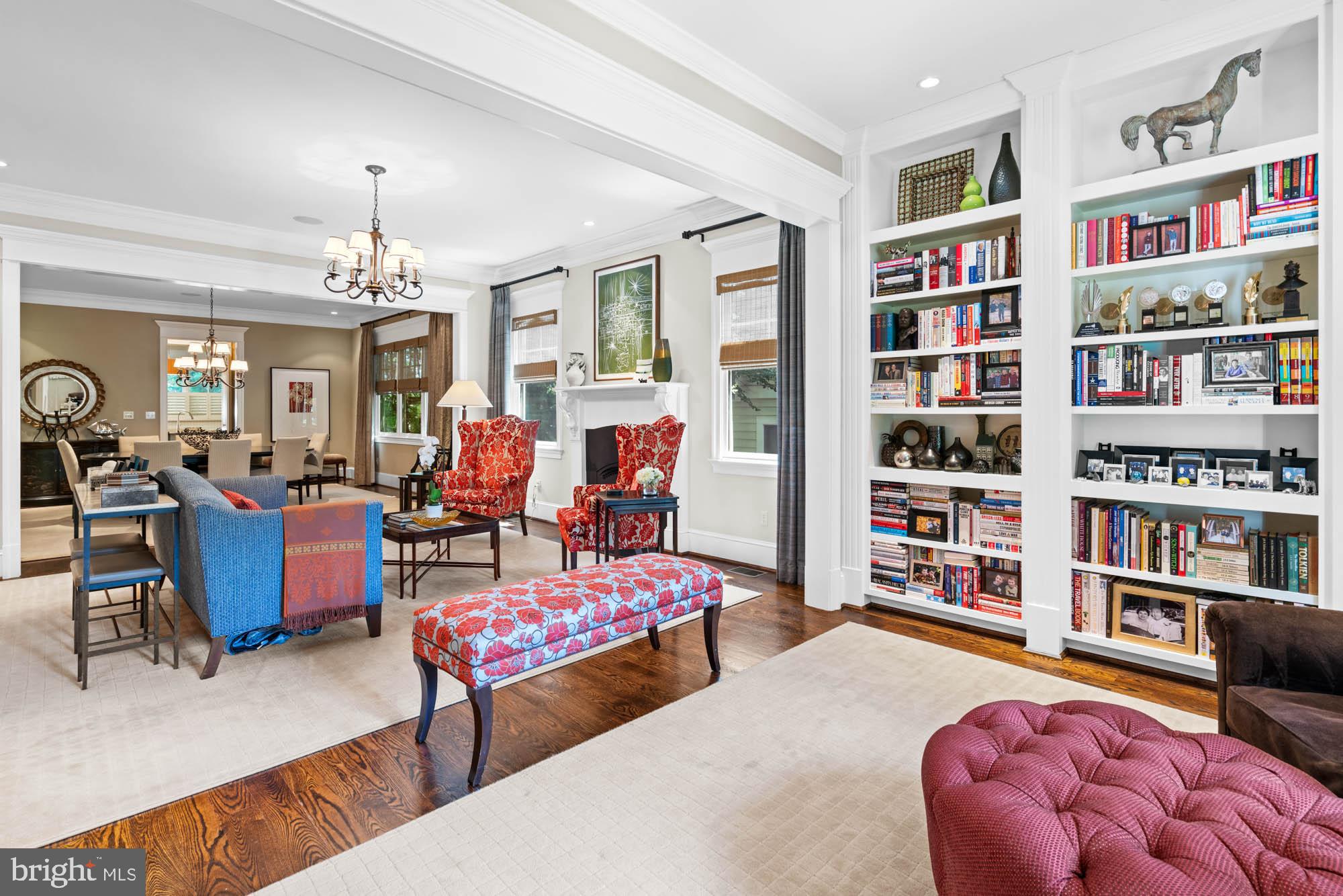 2215 King Place Northwest Washington, DC 20007 - Photo 12 of 58 a living room with furniture and a book shelf