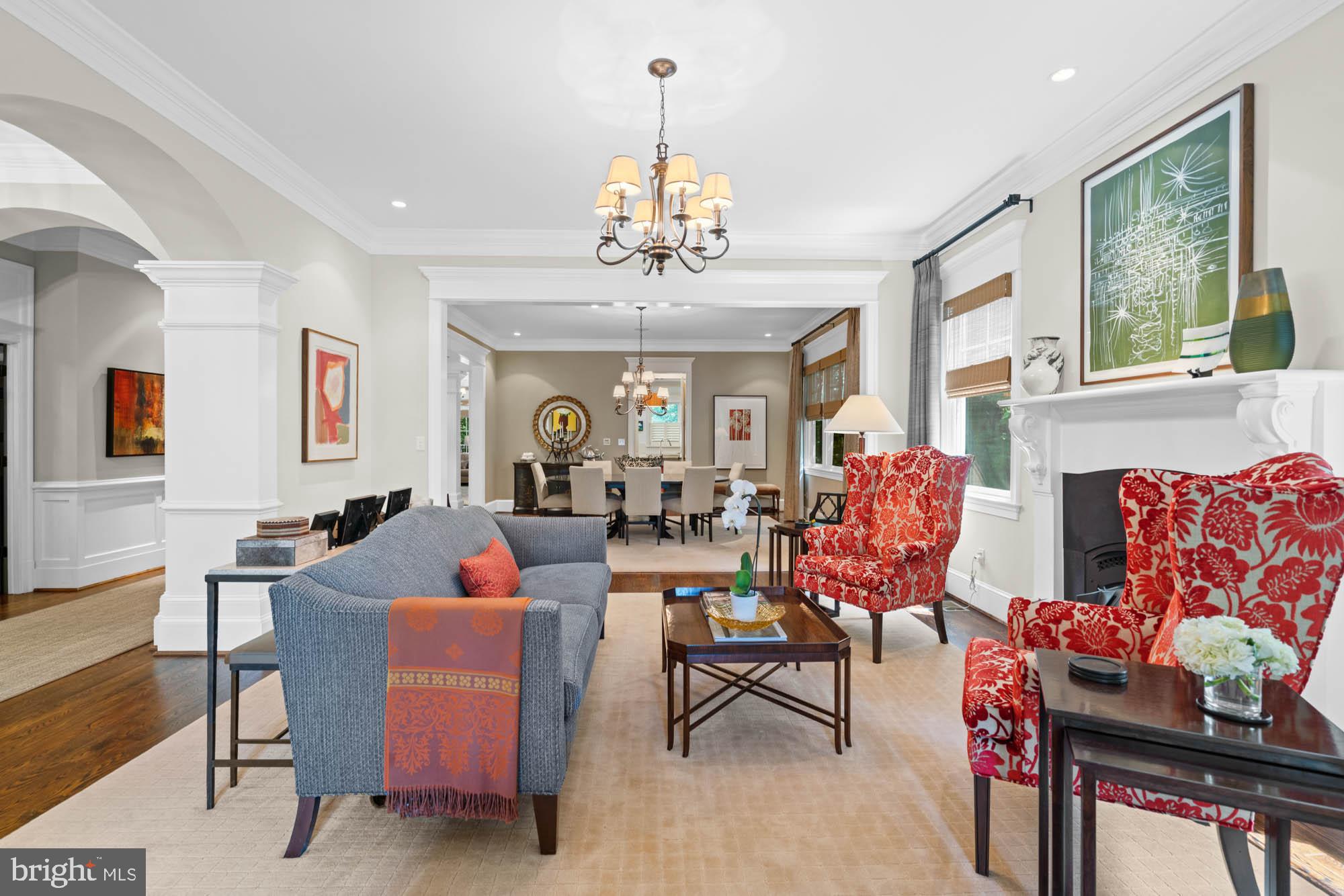 2215 King Place Northwest Washington, DC 20007 - Photo 13 of 58 a living room with fireplace furniture and a chandelier