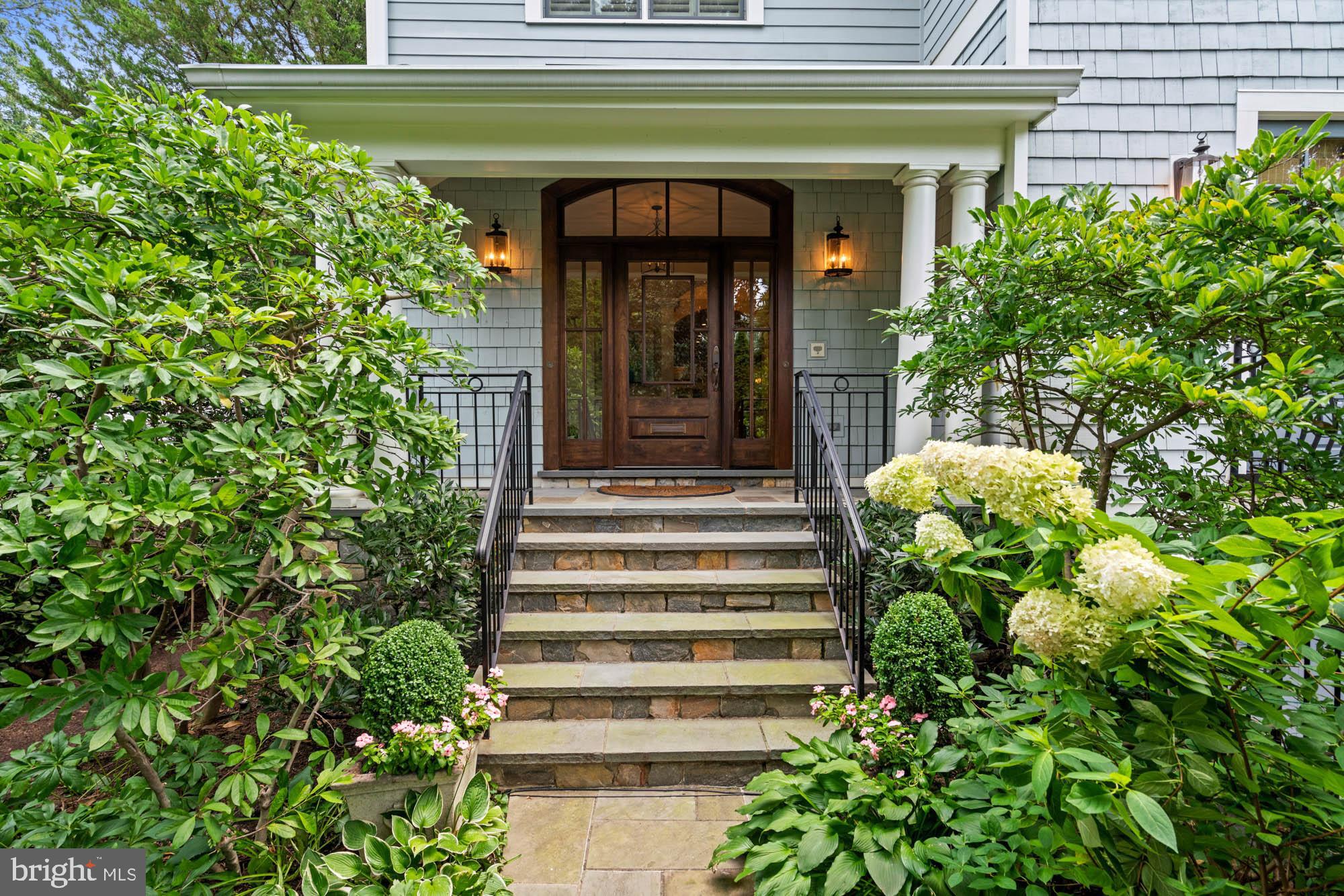2215 King Place Northwest Washington, DC 20007 - Photo 2 of 58 a front view of a house with plants