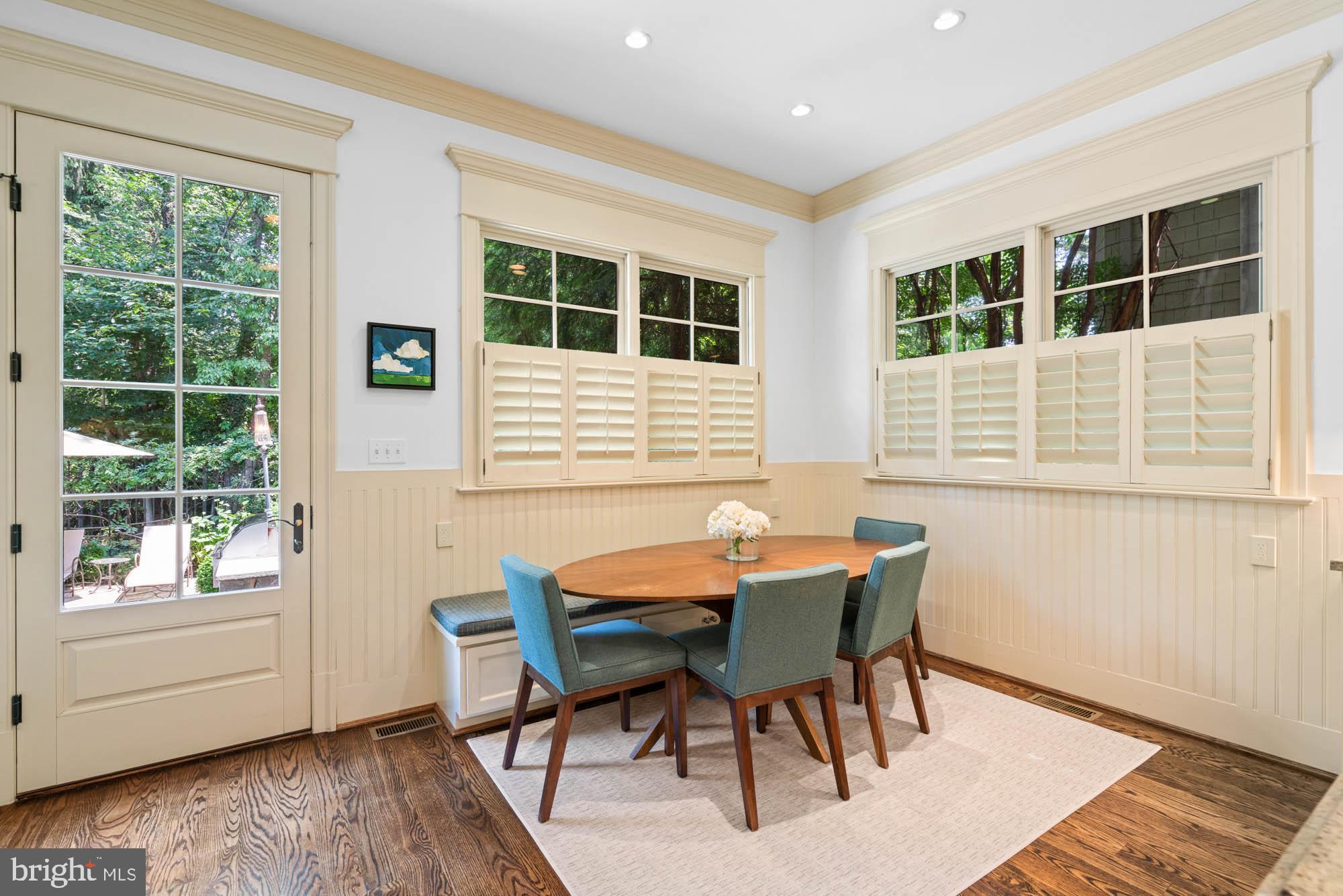2215 King Place Northwest Washington, DC 20007 - Photo 21 of 58 a view of a dining room with furniture and windows