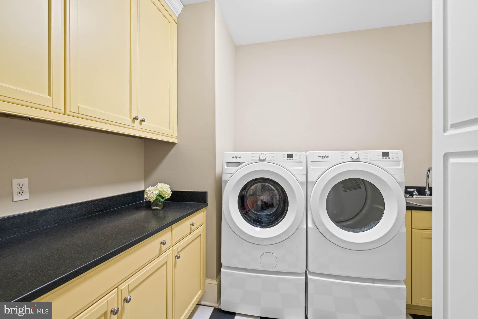 2215 King Place Northwest Washington, DC 20007 - Photo 32 of 58 a utility room with dryer and washer