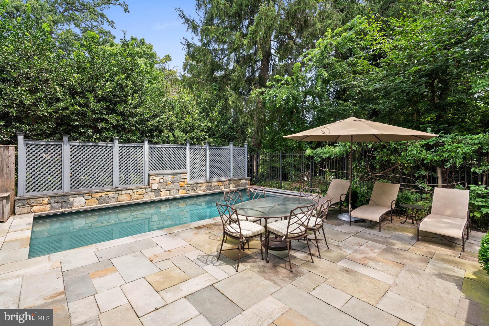 2215 King Place Northwest Washington, DC 20007 - Photo 54 of 58 a view of backyard with seating space and trees