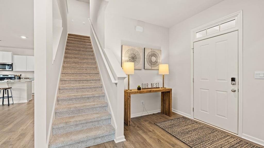 3873 Donetta Drive Atlanta, GA 30349 - Photo 4 of 50 a view of entryway and hall with wooden floor
