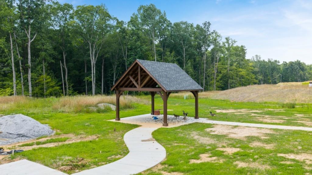 3873 Donetta Drive Atlanta, GA 30349 - Photo 42 of 50 a view of a table and chairs in the garden
