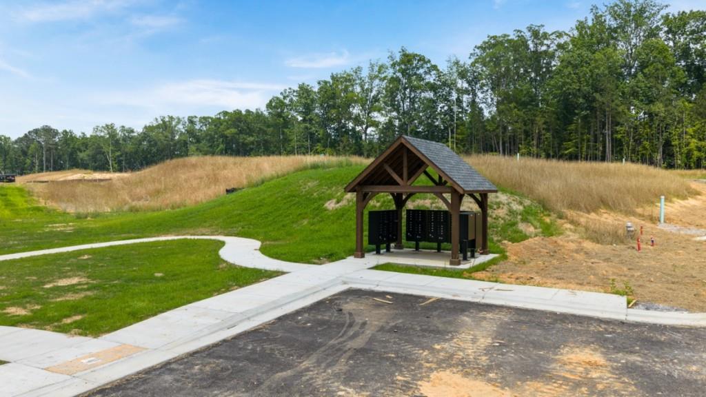 3873 Donetta Drive Atlanta, GA 30349 - Photo 43 of 50 a front view of a house with yard