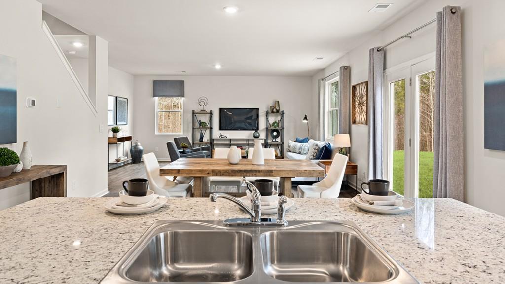 3873 Donetta Drive Atlanta, GA 30349 - Photo 9 of 50 a living room with granite countertop furniture and a fireplace