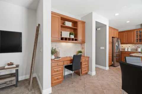 a room with furniture and a flat screen tv