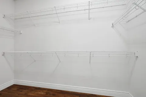 a view of a room with racks on the wall