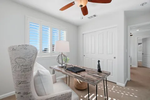 a room with furniture and window