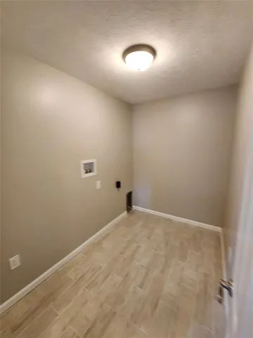 a house view with a backyard space