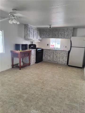 a room with cabinets and window