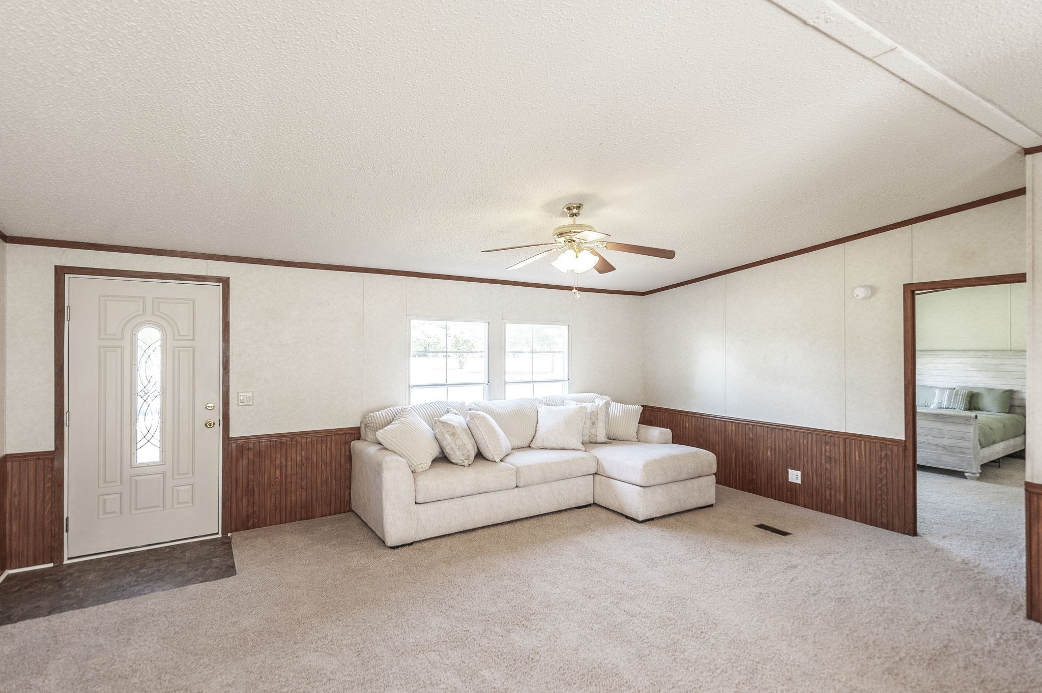 136 East Biggs Road Portland, TN 37148 - Photo 12 of 47 a living room with furniture and chandelier