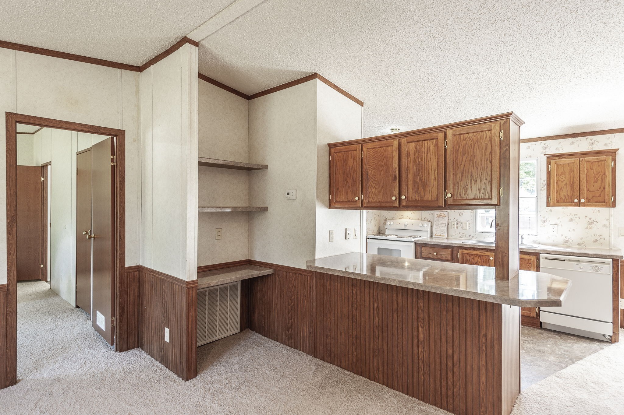 136 East Biggs Road Portland, TN 37148 - Photo 15 of 47 a kitchen with stainless steel appliances a refrigerator and cabinets