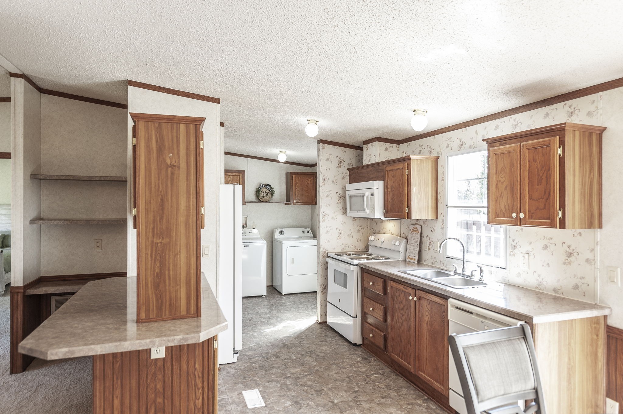 136 East Biggs Road Portland, TN 37148 - Photo 16 of 47 a kitchen with a sink stove and refrigerator