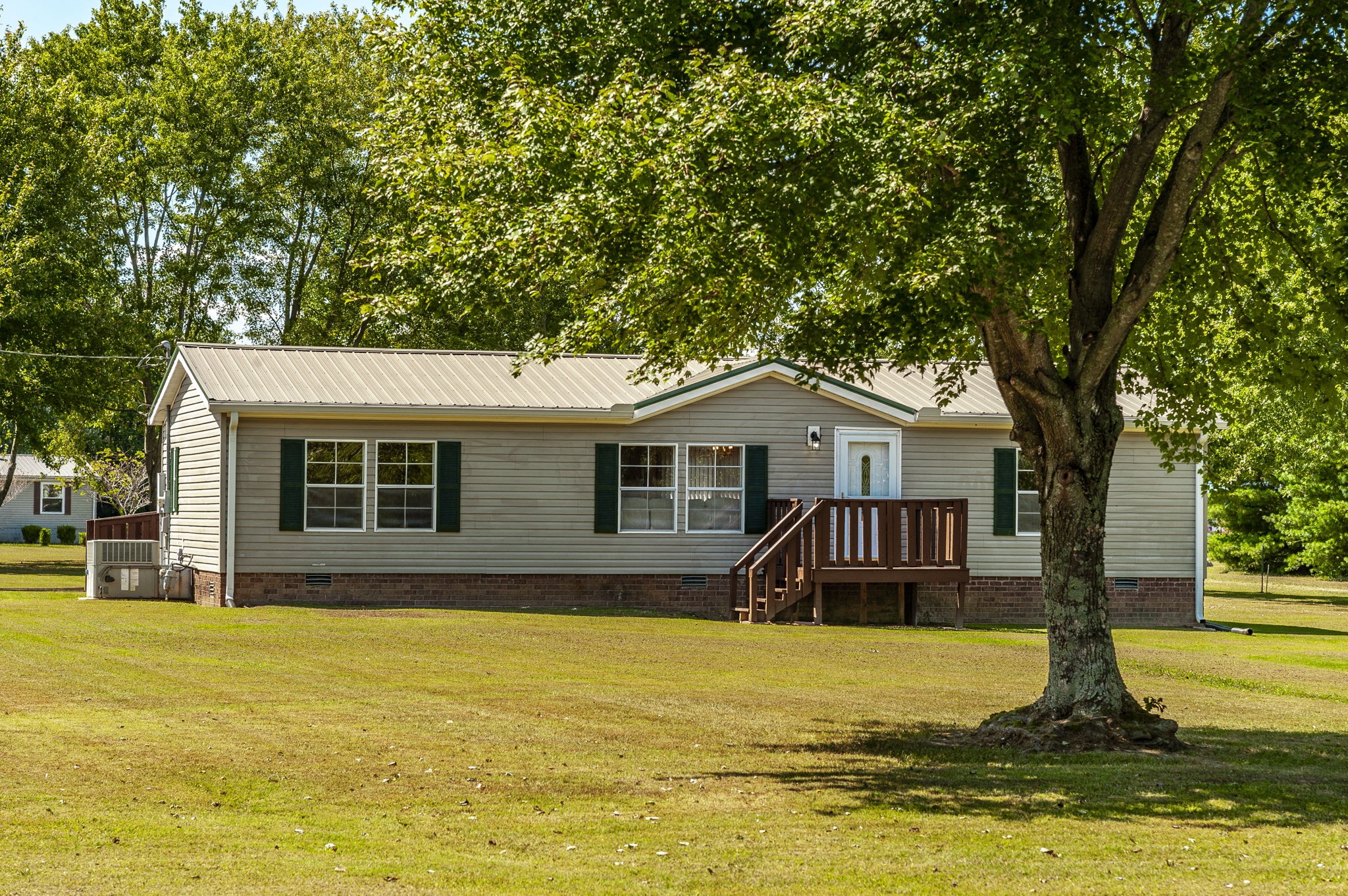 136 East Biggs Road Portland, TN 37148 - Photo 2 of 47 a front view of house with yard and swimming pool