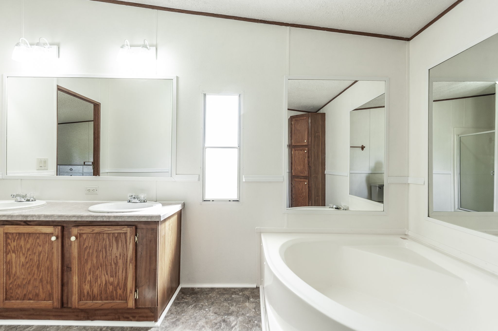 136 East Biggs Road Portland, TN 37148 - Photo 29 of 47 a bathroom with a tub sink and mirror
