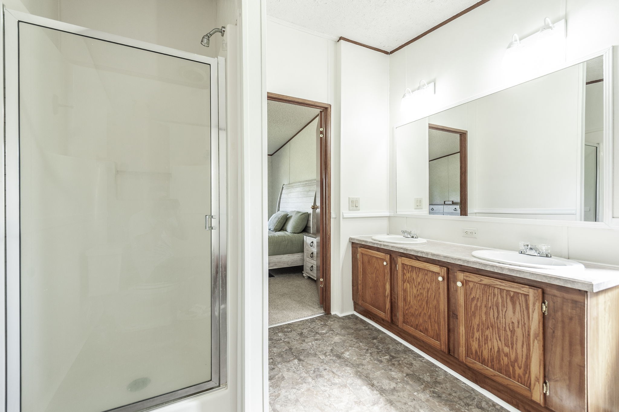 136 East Biggs Road Portland, TN 37148 - Photo 30 of 47 a bathroom with a double vanity sink and a mirror
