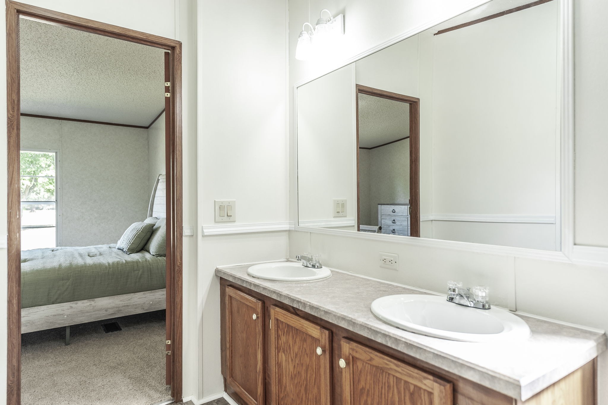 136 East Biggs Road Portland, TN 37148 - Photo 31 of 47 a en suite bathroom with a sink and a mirror