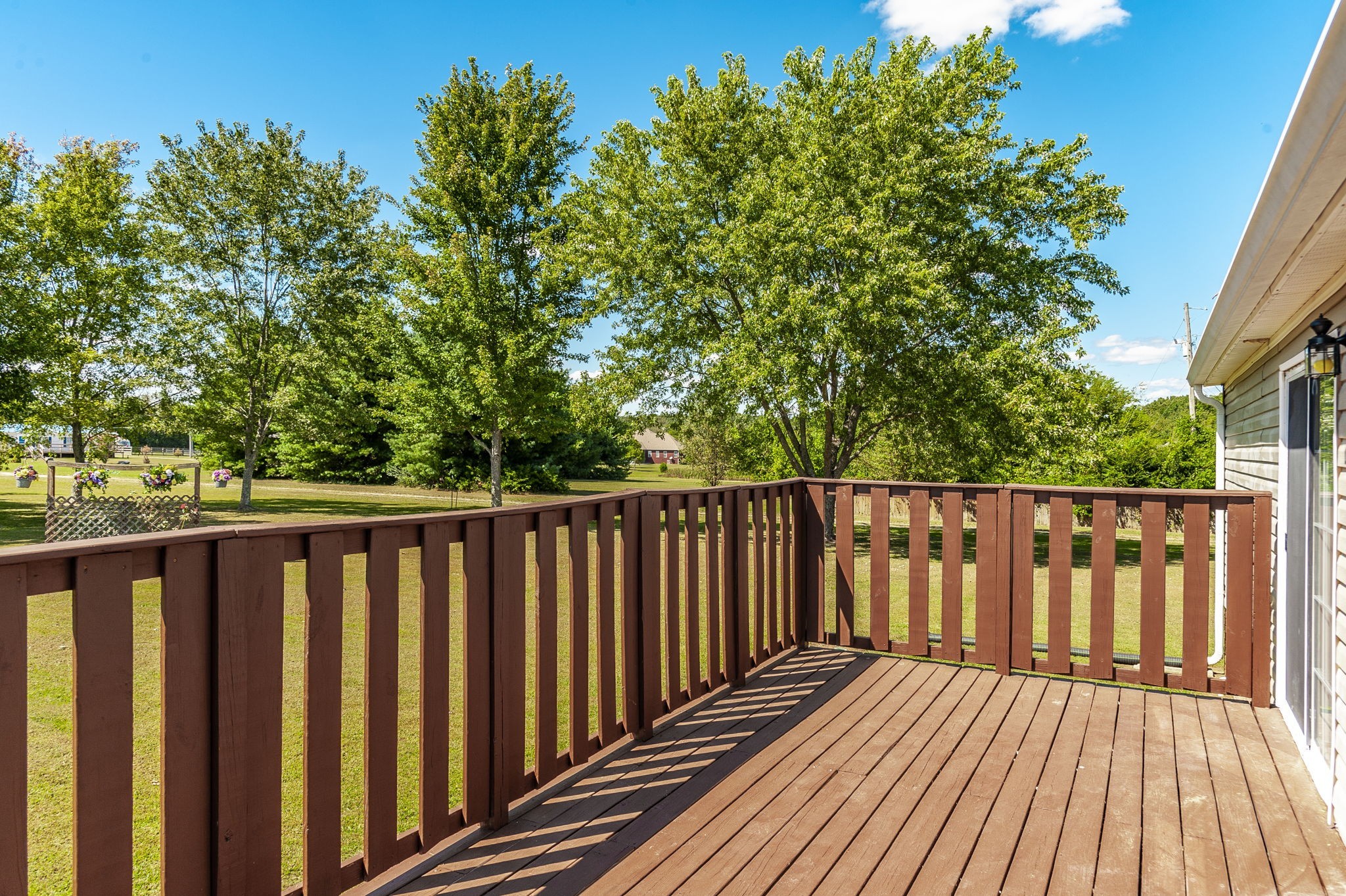 136 East Biggs Road Portland, TN 37148 - Photo 41 of 47 a balcony with wooden floor and fence