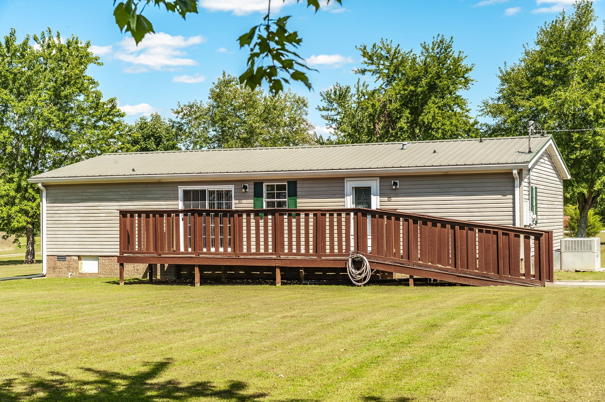 136 East Biggs Road Portland, TN 37148 - Photo 44 of 47 a view of a house with a swimming pool
