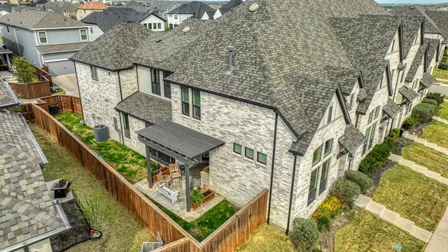 a balcony with tall trees
