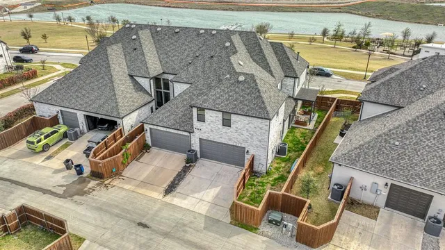 an aerial view of a house with swimming pool
