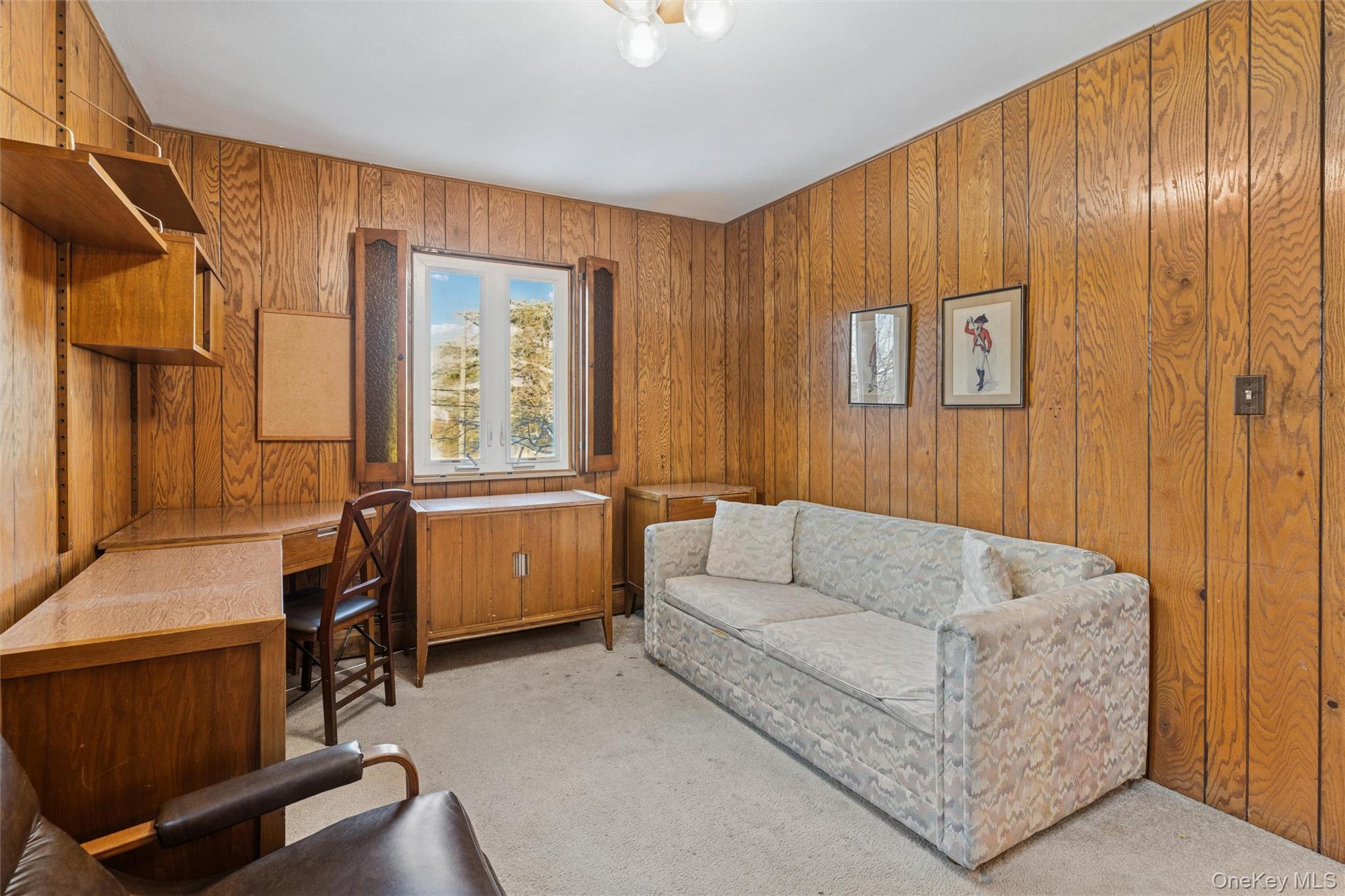 1864 Cynthia Lane Merrick, NY 11566 - Photo 17 of 33 a living room with furniture and a window