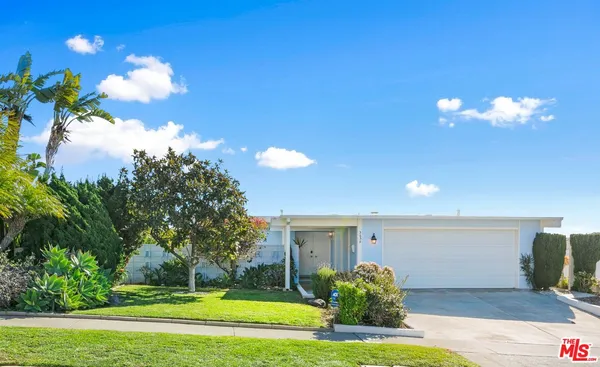 a view of a house with a big yard