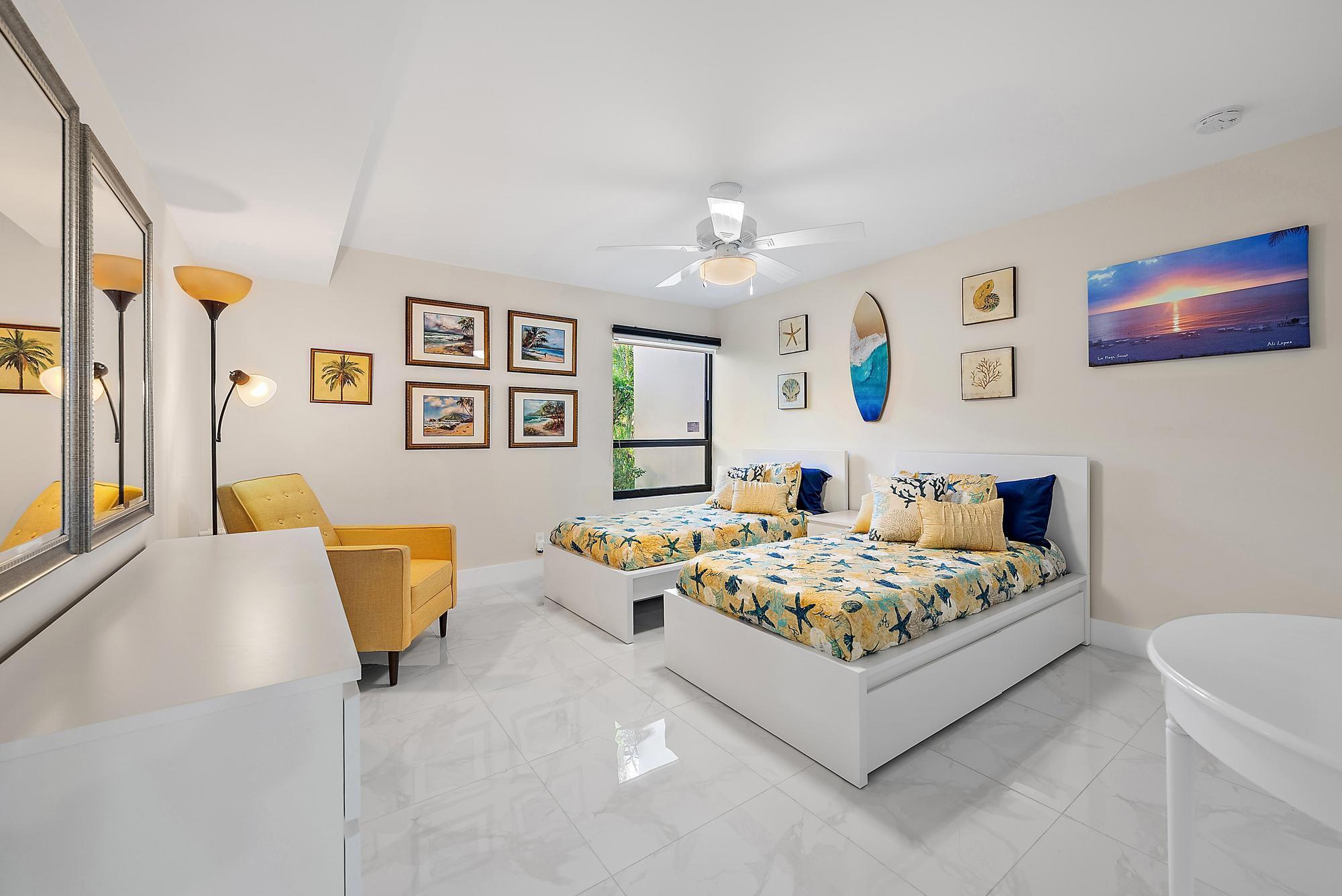 3693 Quail Ridge Drive, Unit BOBWHITE B Boynton Beach, FL 33436 - Photo 16 of 39 a living room with furniture and window