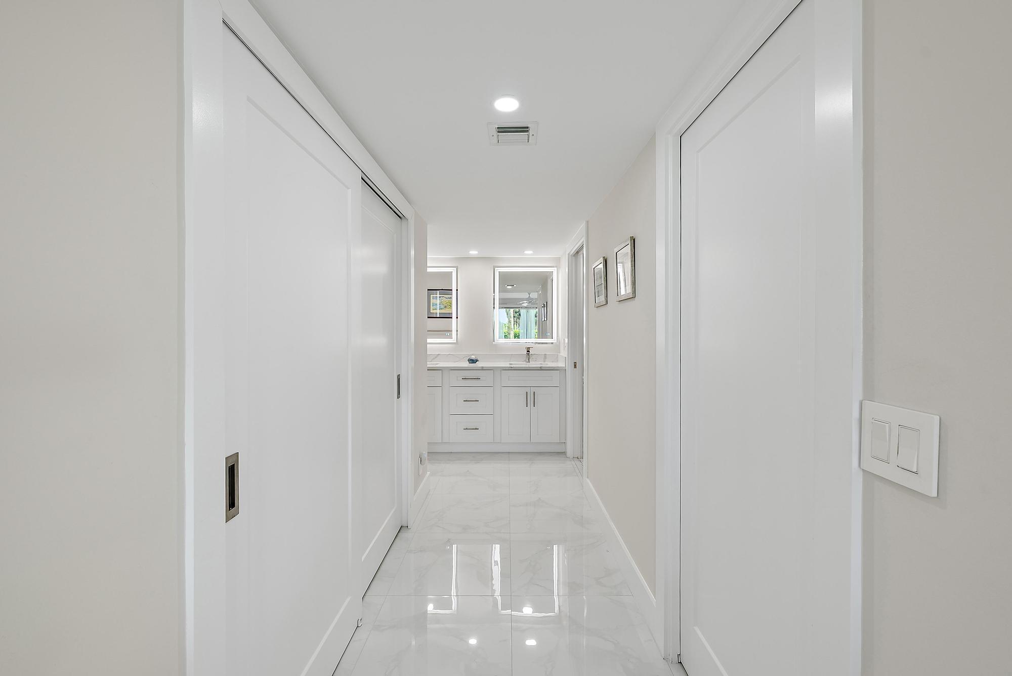 3693 Quail Ridge Drive, Unit BOBWHITE B Boynton Beach, FL 33436 - Photo 19 of 39 a view of walk in closet with white walls