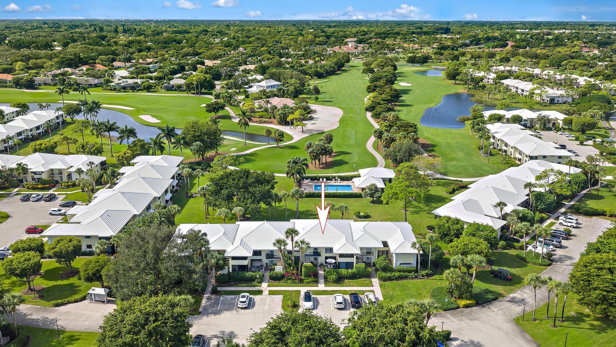 3693 Quail Ridge Drive, Unit BOBWHITE B Boynton Beach, FL 33436 - Photo 22 of 39 an aerial view of a