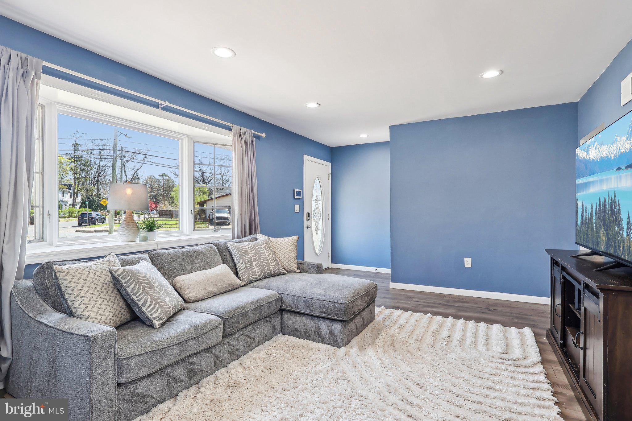 96 East 9th Avenue Pine Hill, NJ 08021 - Photo 2 of 31 a living room with furniture and a window