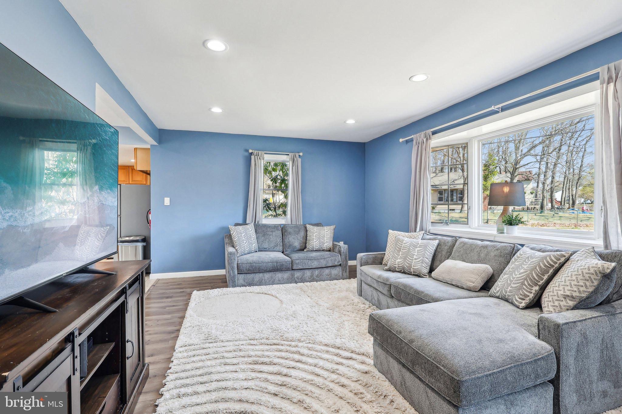 96 East 9th Avenue Pine Hill, NJ 08021 - Photo 3 of 31 a living room with furniture and a window