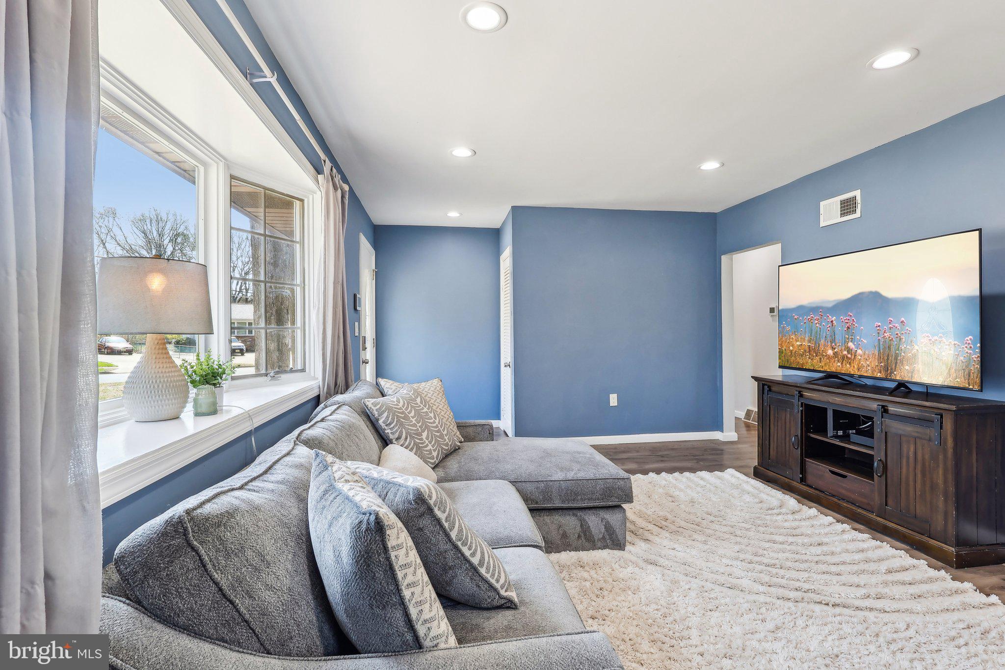 96 East 9th Avenue Pine Hill, NJ 08021 - Photo 4 of 31 a bedroom with furniture and a flat screen tv