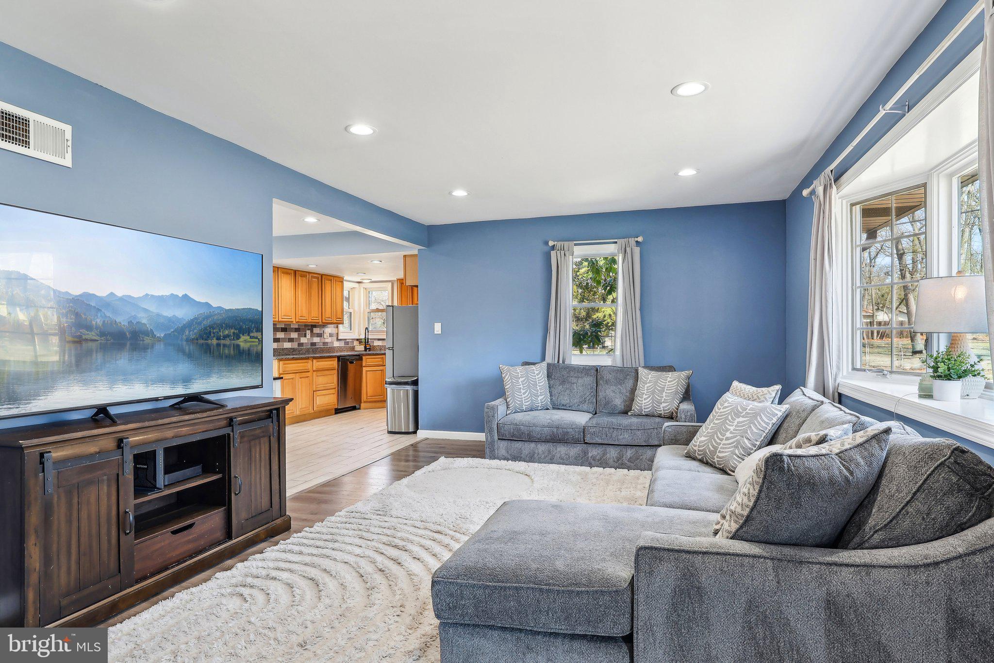 96 East 9th Avenue Pine Hill, NJ 08021 - Photo 5 of 31 a living room with furniture and a fireplace