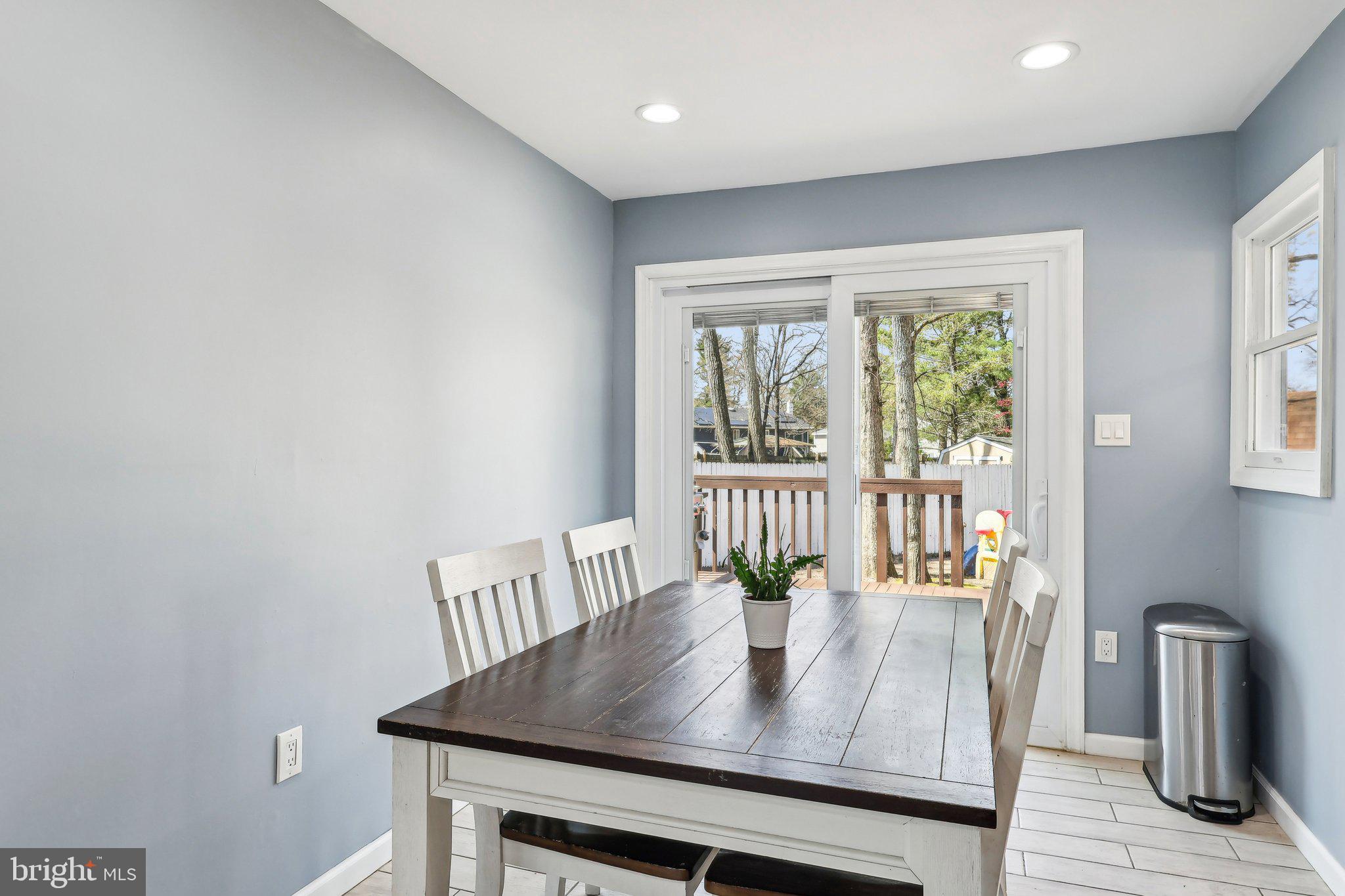 96 East 9th Avenue Pine Hill, NJ 08021 - Photo 7 of 31 a view of a dining room with furniture and a window