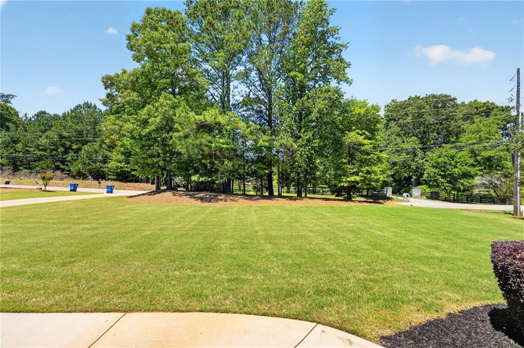 2300 Tucker Mill Road Southwest Conyers, GA 30094 - Photo 36 of 45 a view of an outdoor space and swimming pool