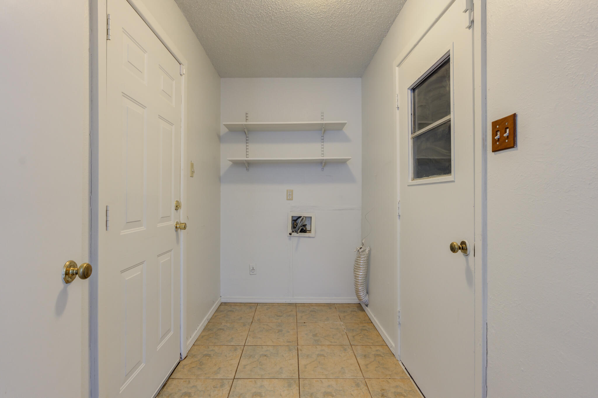 1313 Adrian Street Lubbock, TX 79403 - Photo 24 of 26 a view of a hallway