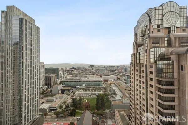 a view of a city with tall buildings