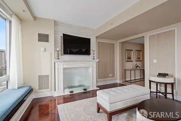 a living room with a couch and a flat screen tv