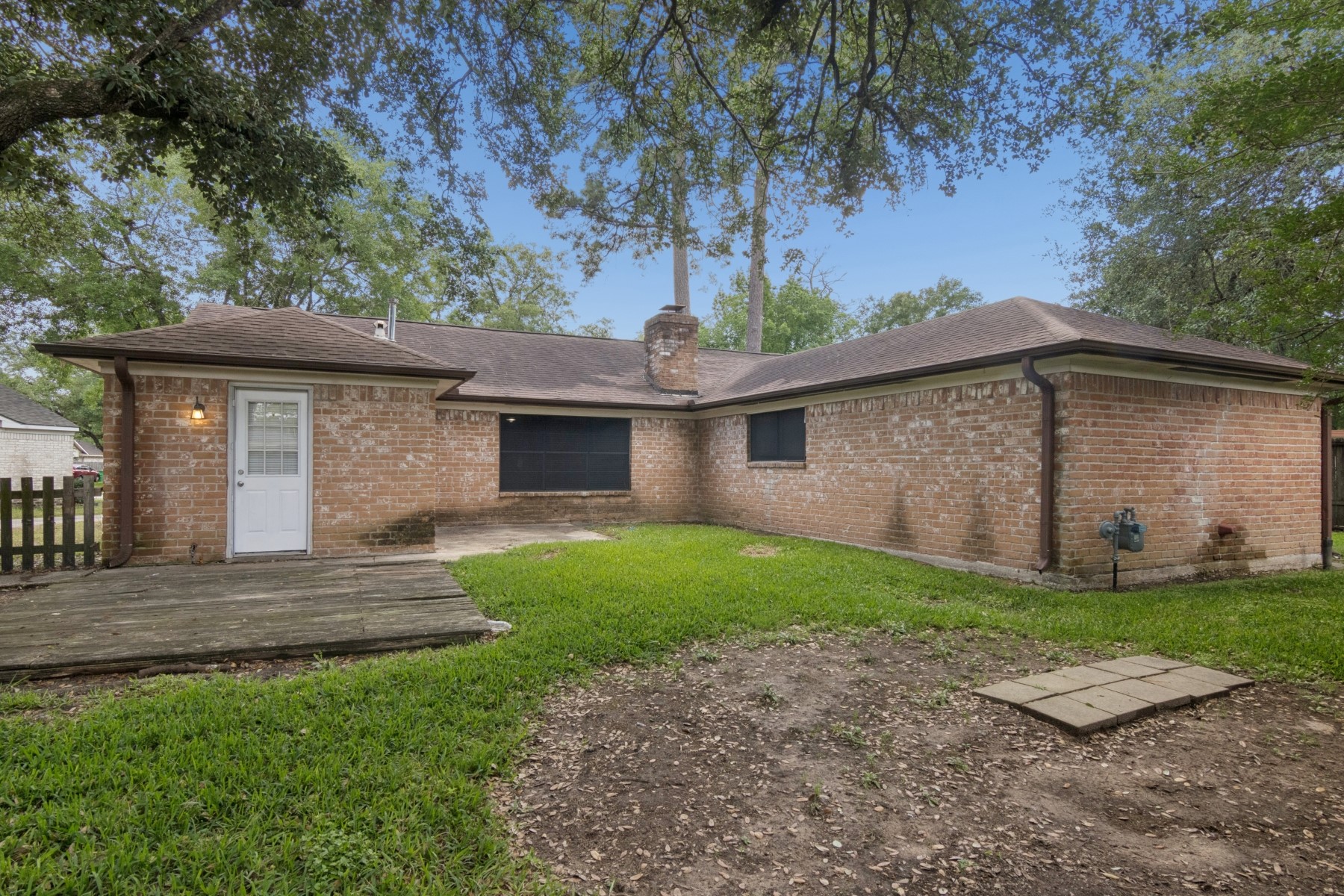2607 Allyson Court Spring, TX 77373 - Photo 24 of 25 a front view of a house with a garden