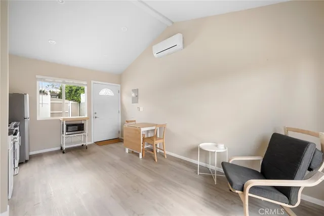 a view of a livingroom with furniture and a chair