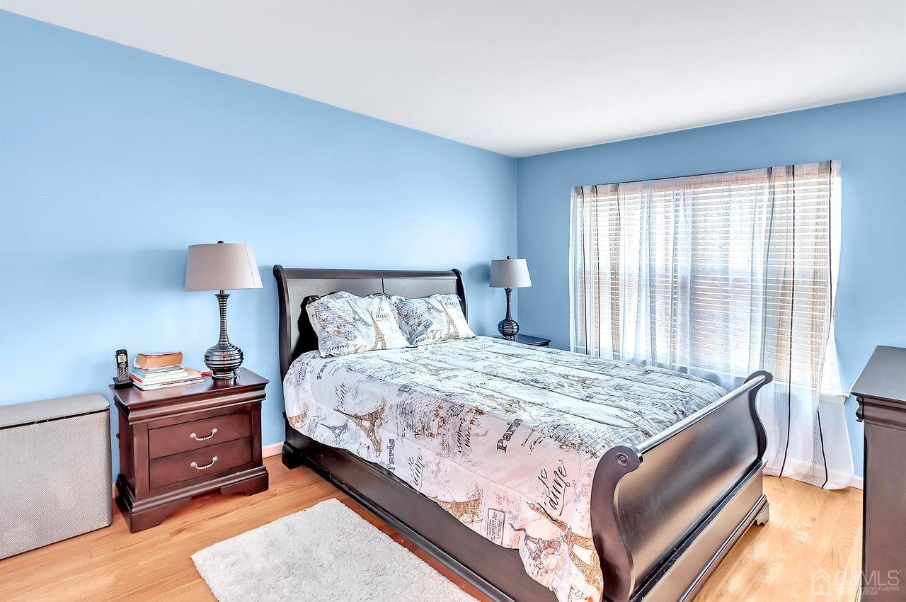 5 Rondell Lane, Unit 198 Old Bridge, NJ 08879 - Photo 13 of 23 a bedroom with a bed and a window