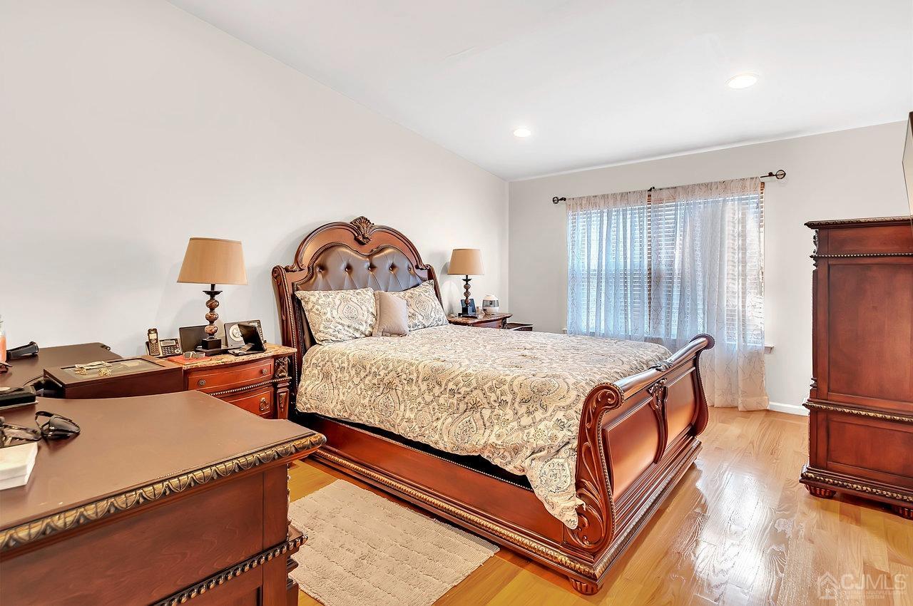 5 Rondell Lane, Unit 198 Old Bridge, NJ 08879 - Photo 16 of 23 a bedroom with bed and window