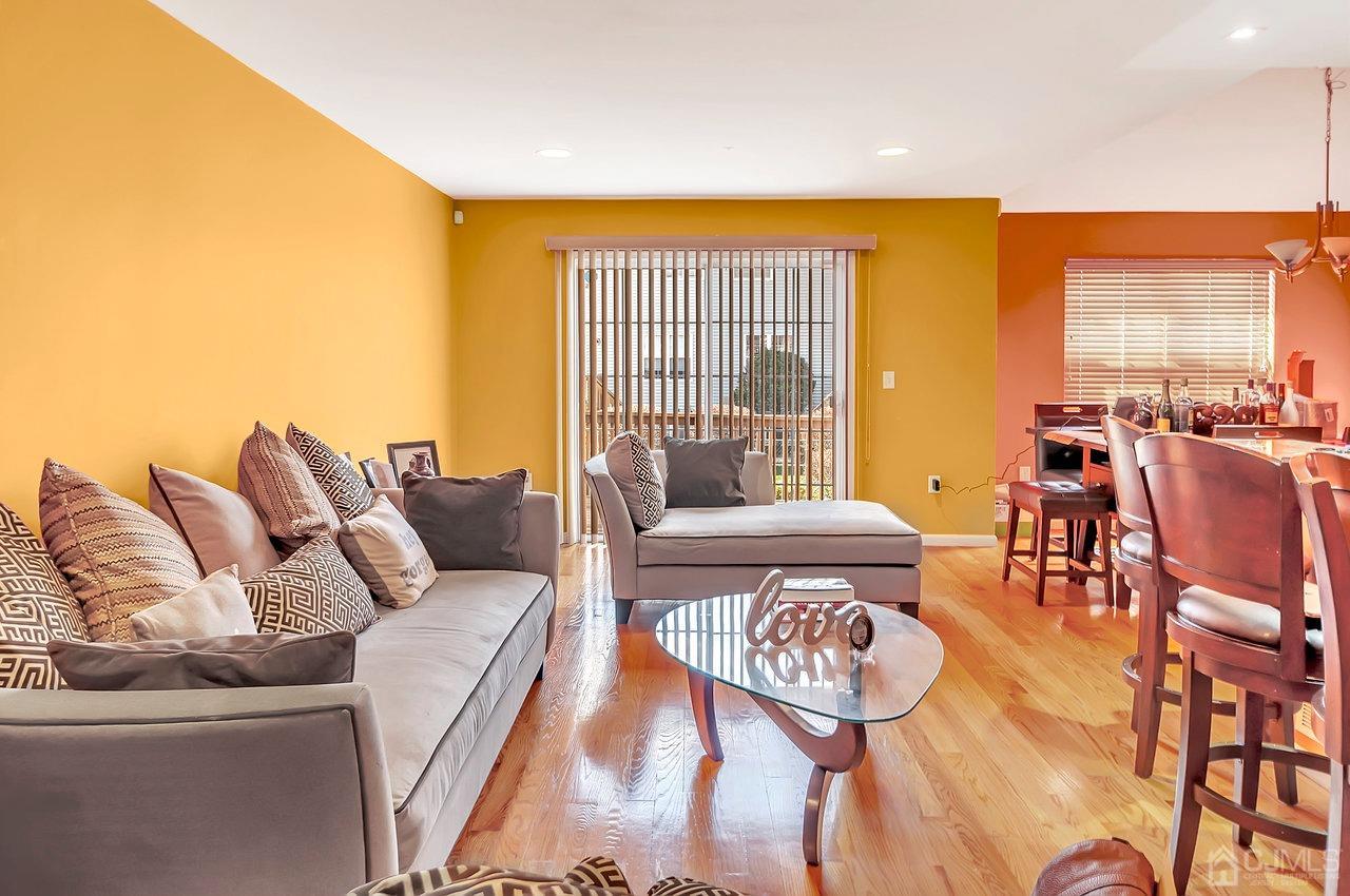 5 Rondell Lane, Unit 198 Old Bridge, NJ 08879 - Photo 4 of 23 a living room with furniture and a large window