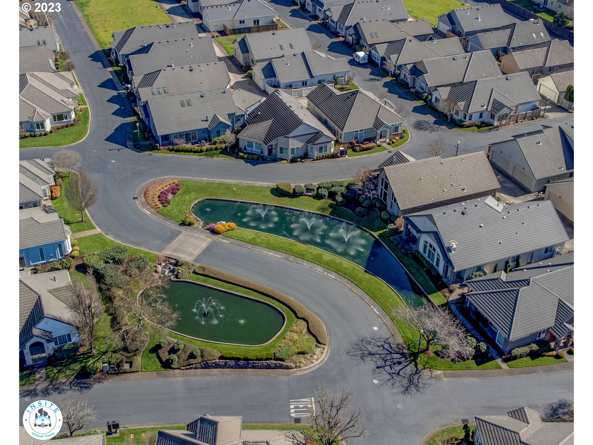 2006 Lakeland Way Eugene, OR 97408 - Photo 32 of 32 an aerial view of a house with a swimming pool