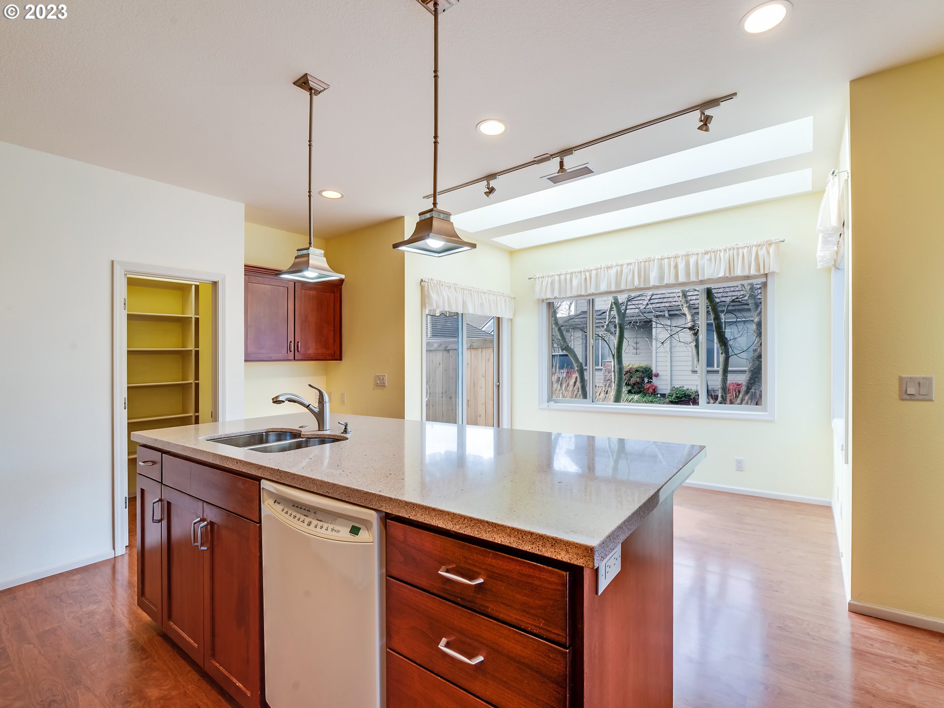 2006 Lakeland Way Eugene, OR 97408 - Photo 6 of 32 a kitchen with a sink a counter space and wooden floor