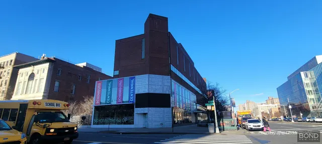 a view of a house with a street