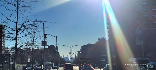 a view of a city street from a building