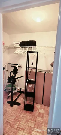 a view of a room with racks on the wall